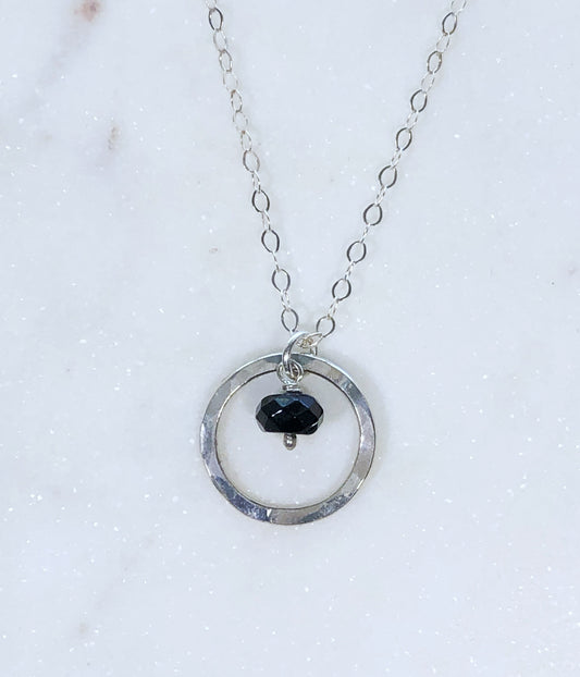 Sterling silver forged circle necklace with onyx gemstone