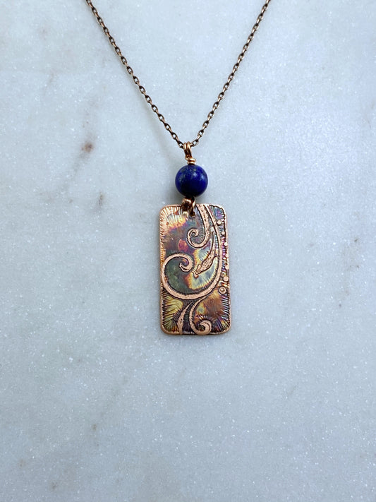 Acid etched copper swirl necklace with lapis