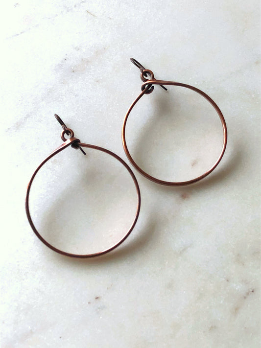 Large copper hoop earrings