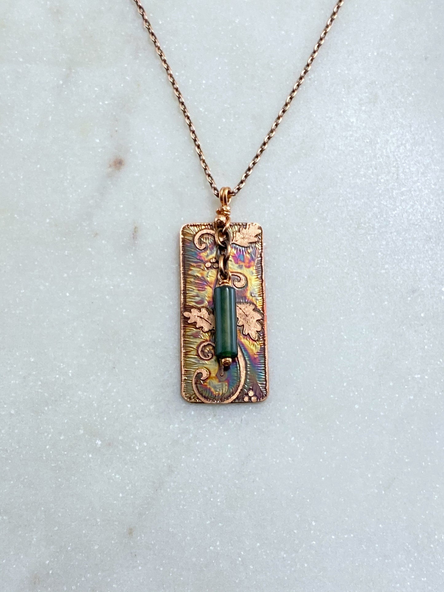 Acid etched copper swirl necklace with moss agate