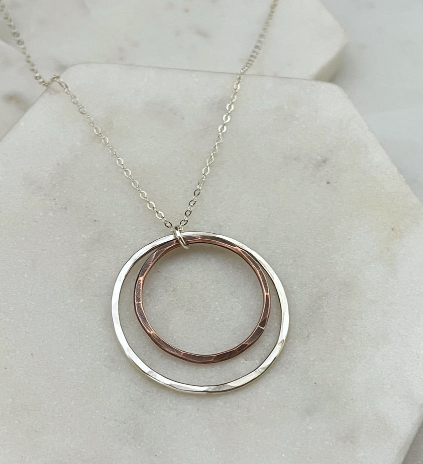 Sterling silver and copper forged hoop necklace