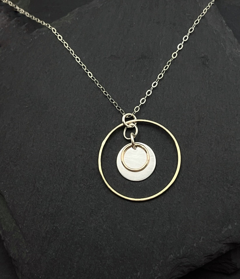 Forged sterling silver and 14 karat gold necklace