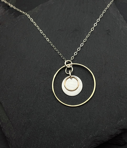 Forged sterling silver and 14 karat gold necklace