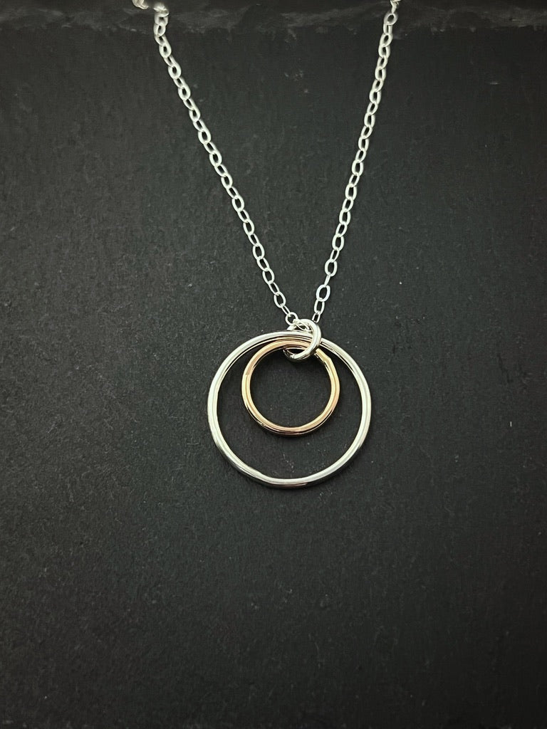Forged sterling silver and 14 karat gold dainty double hoop necklace