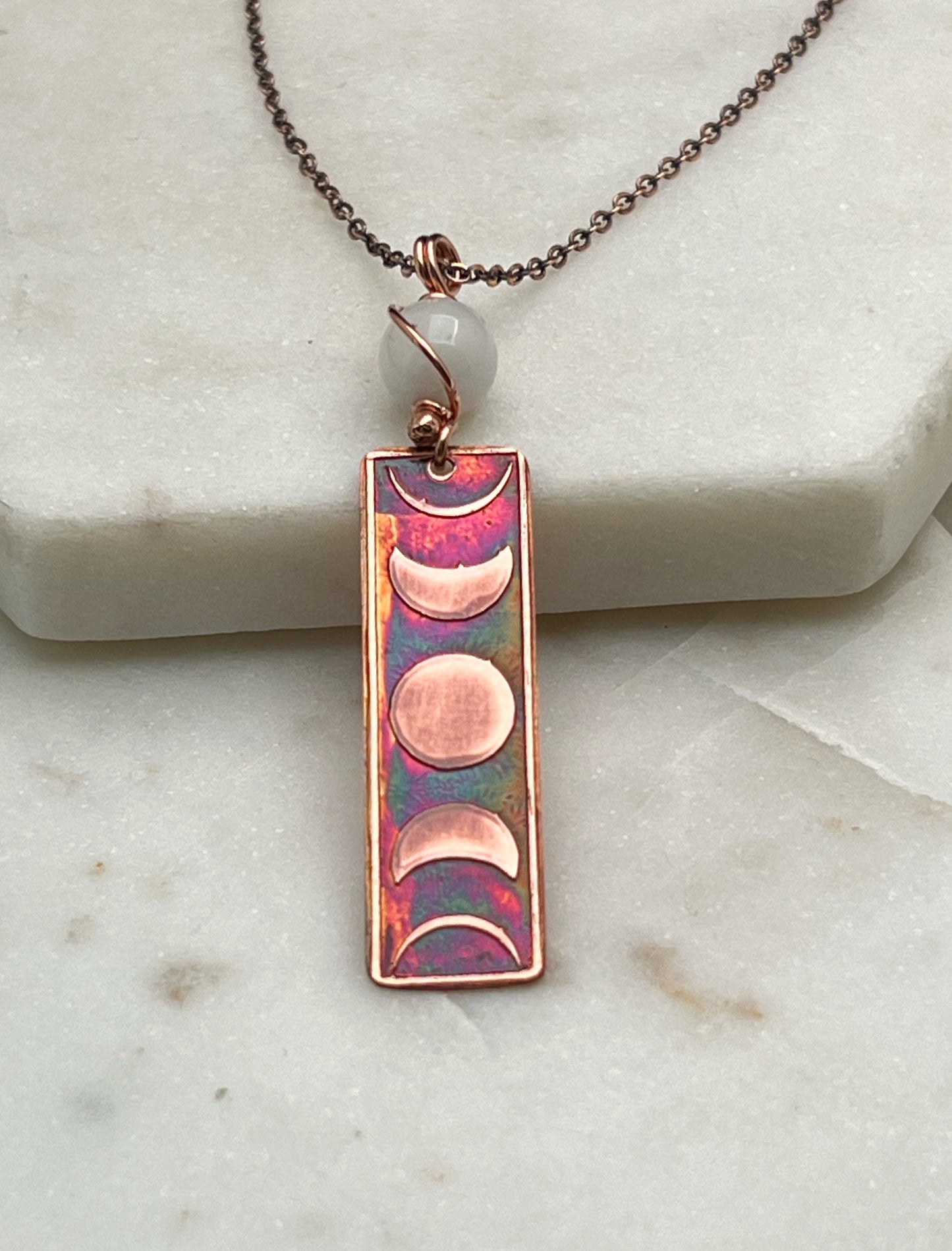 Moon phase acid etched copper necklace with moonstone gemstone