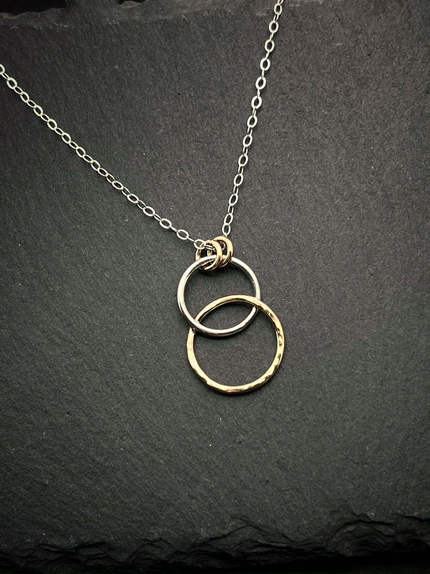 Forged sterling silver and 14 karat gold dainty double hoop necklace