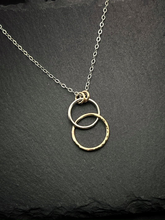 Forged sterling silver and 14 karat gold dainty double hoop necklace