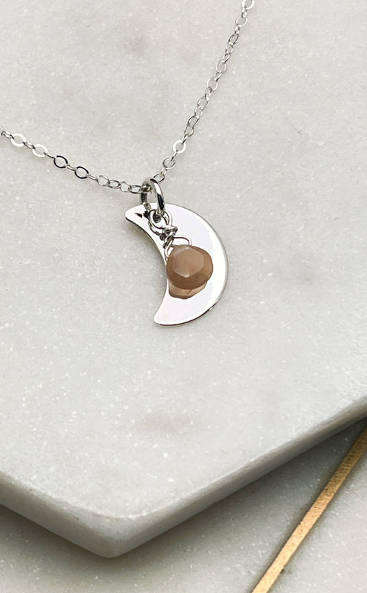 Forged sterling silver moon necklace with peach moonstone