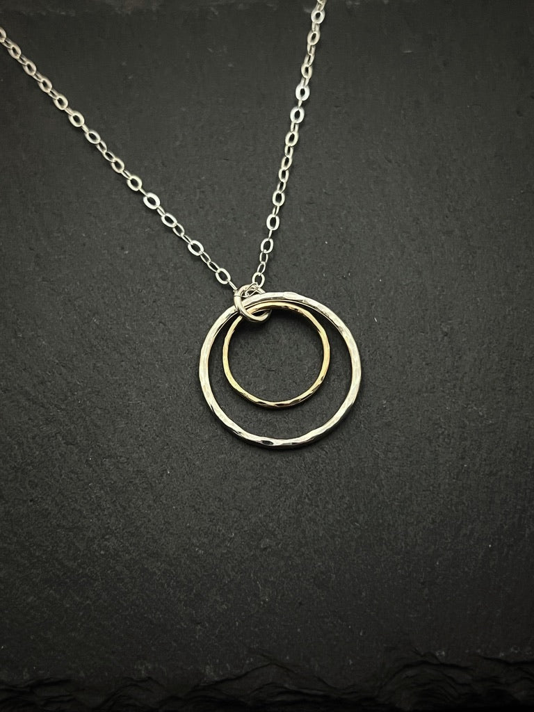 Forged sterling silver and 14 karat gold dainty double hoop necklace