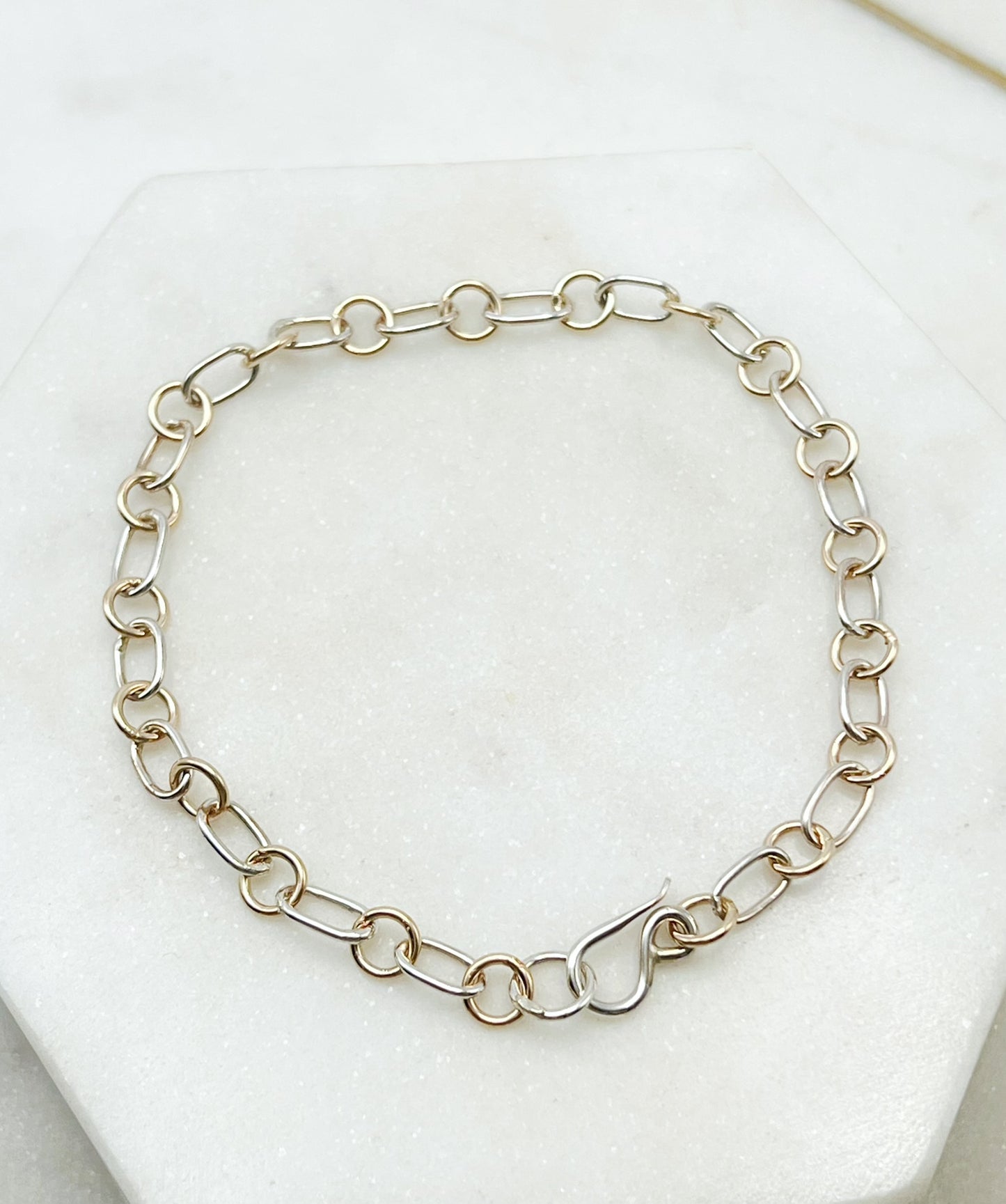 Forged sterling silver and 14k gold chain bracelet