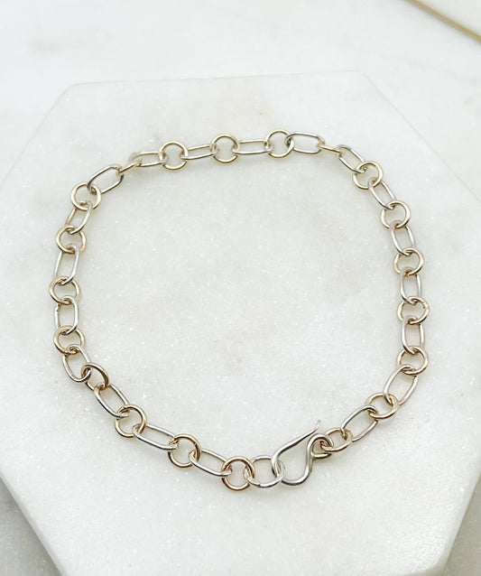 Forged sterling silver and 14k gold chain bracelet