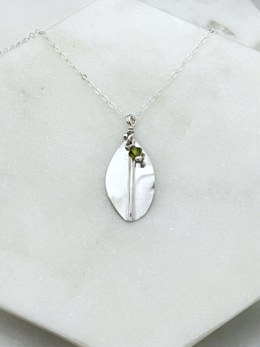 Forged sterling silver leaf necklace with olivine gemstone