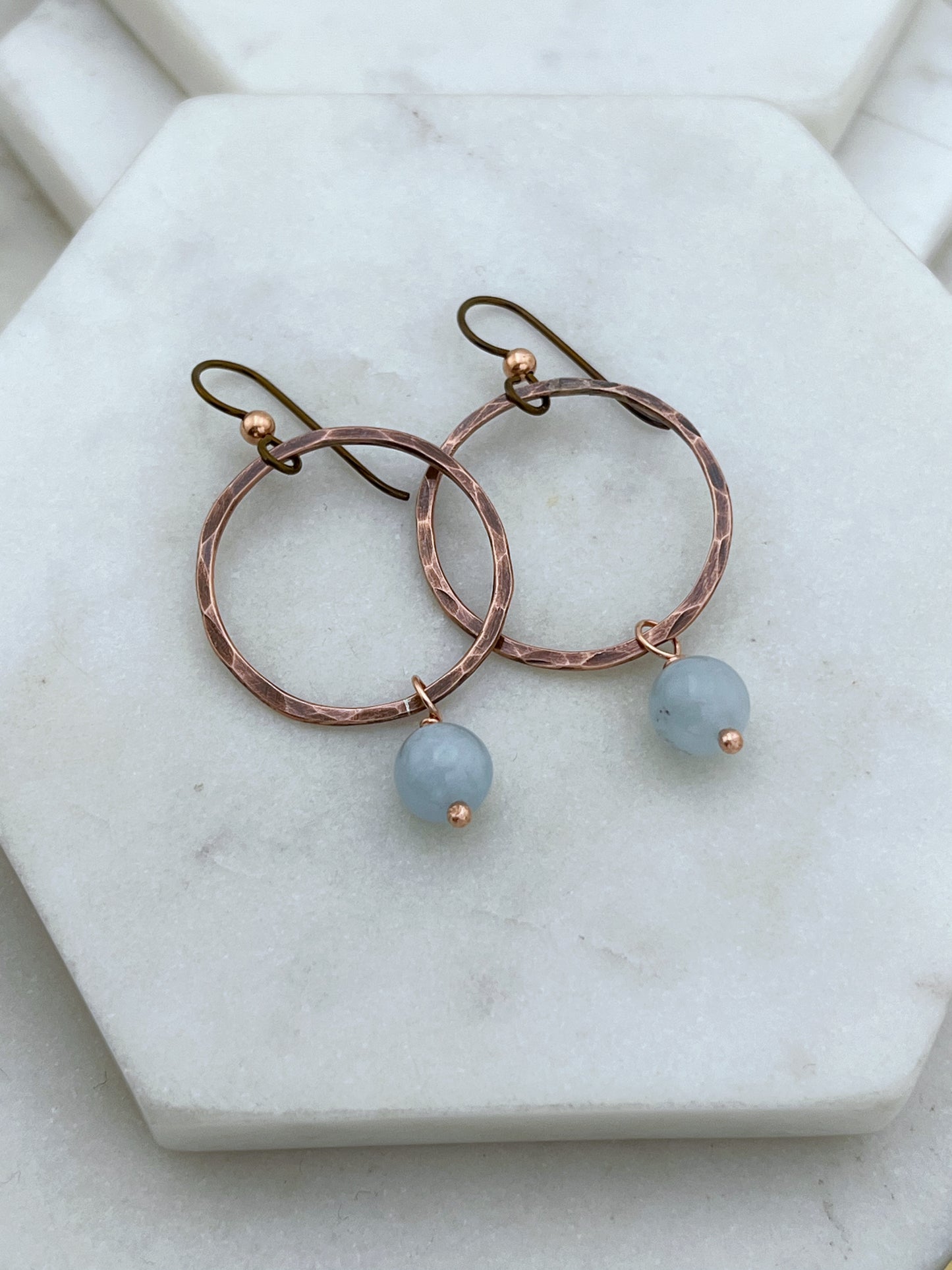 Copper oval hoops with aquamarine gemstones