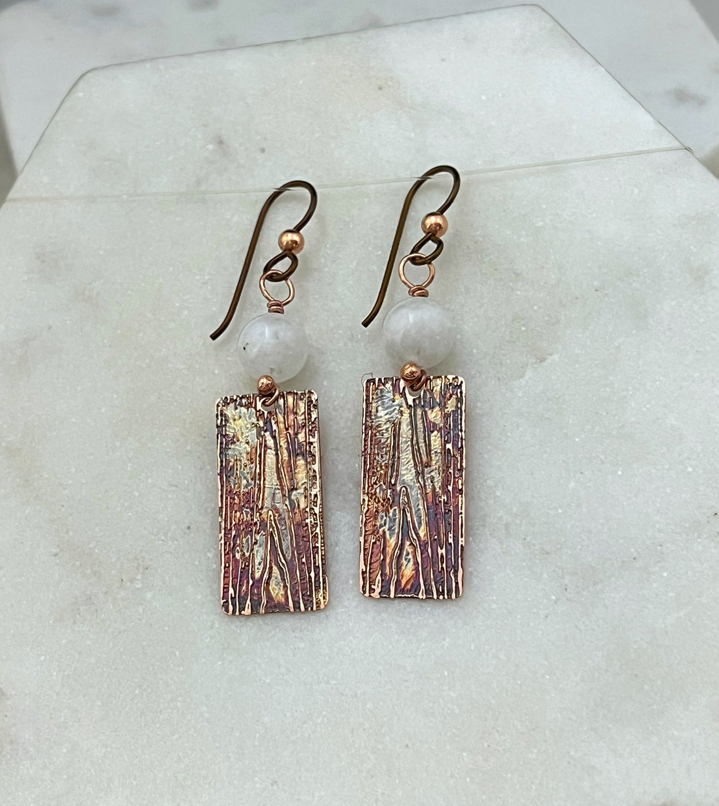 Acid etched copper earrings with moonstone gemstones