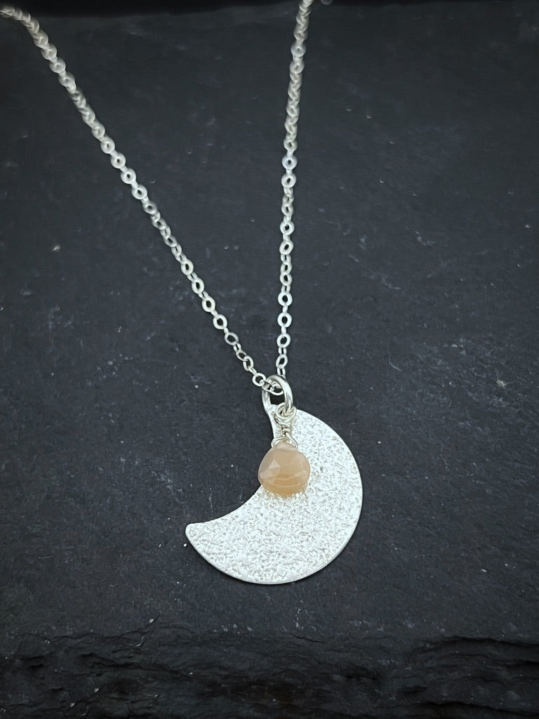 Sterling silver hammered moon with peach moonstone