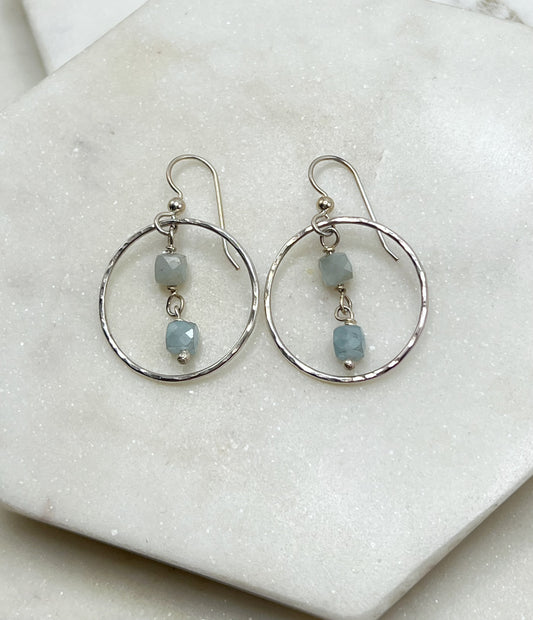 Sterling silver hoop earrings with aquamarine gemstones