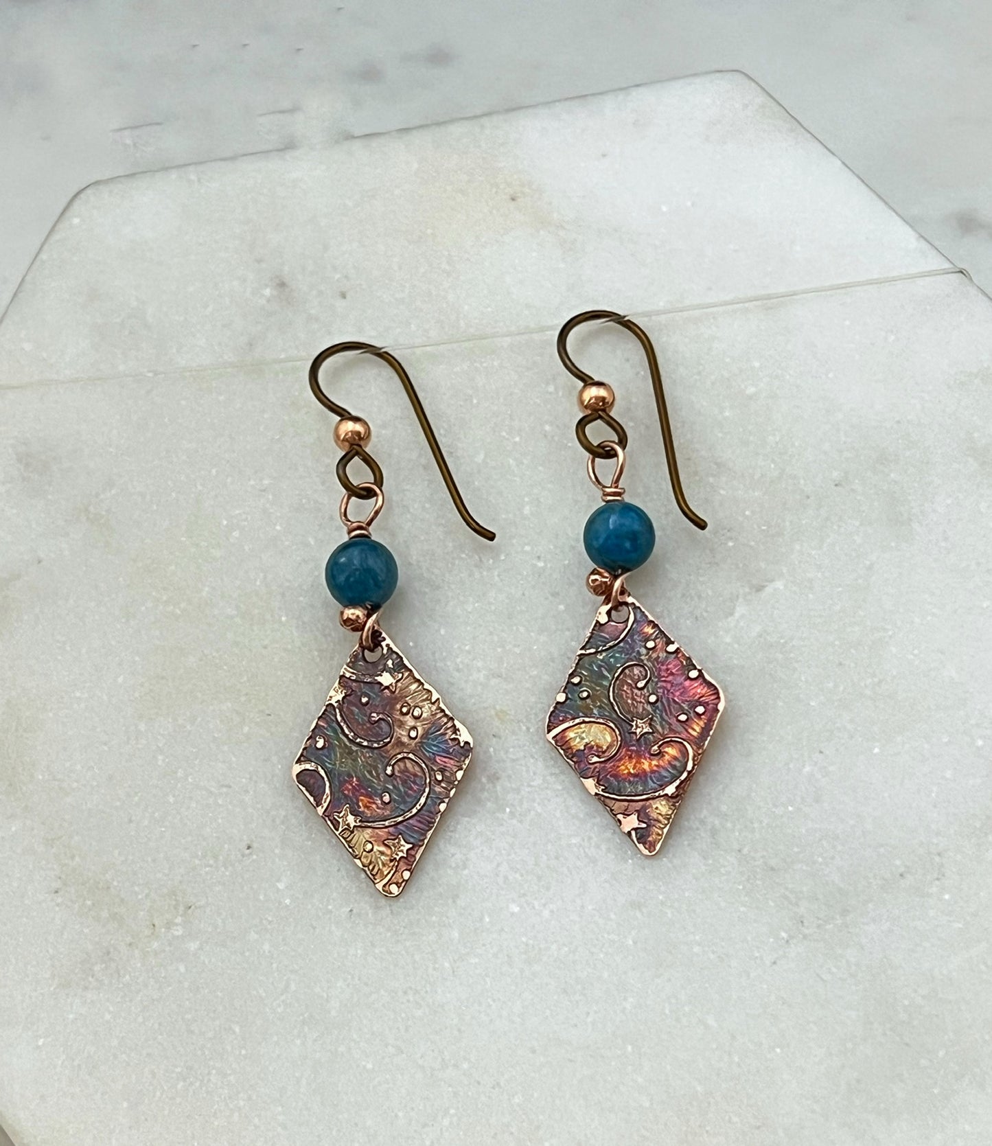 Acid etched copper earrings with apatite gemstones