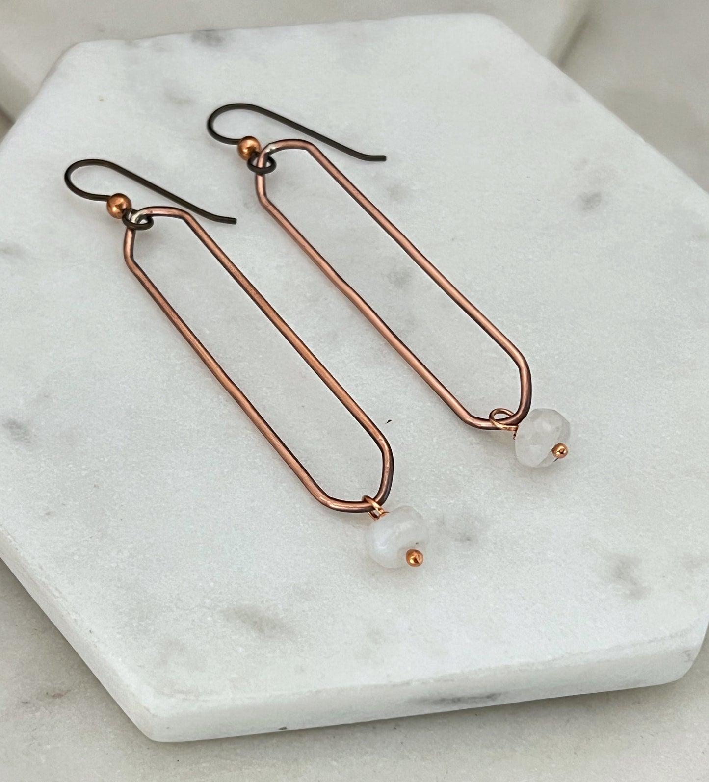 Copper oval hoops with moonstone gemstones