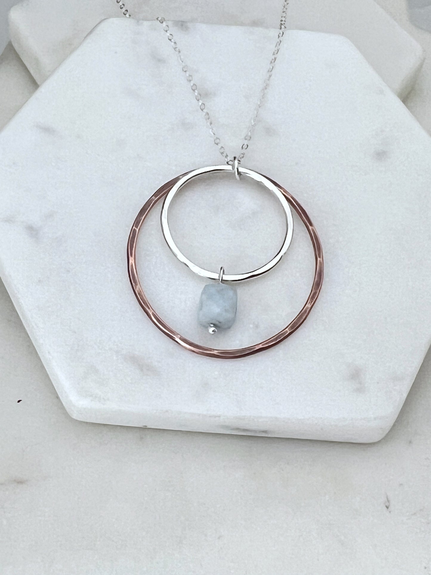 Sterling silver and copper forged hoop necklace with blue opal