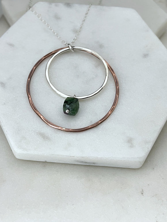 Sterling silver and copper forged hoop necklace with emerald