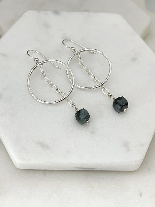 Sterling silver hoops with emerald