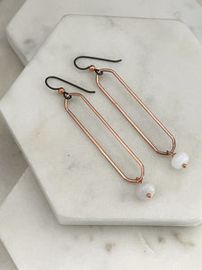 Copper oval hoops with snow quartz gemstones