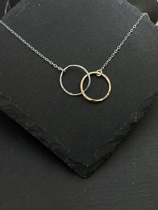 Sterling silver and gold-fill forged double hoop