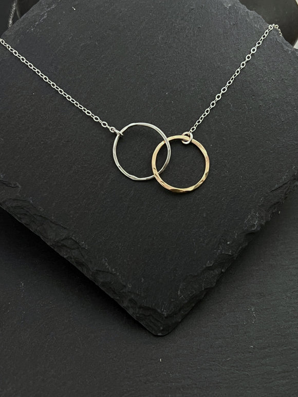 Sterling silver and gold-fill forged double hoop