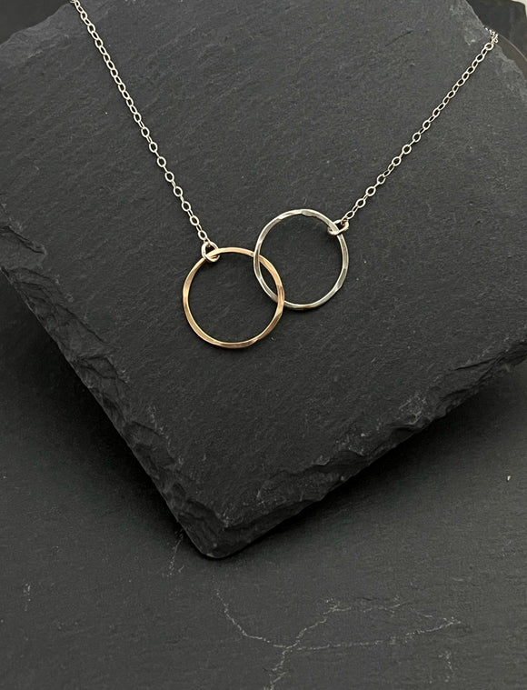 Sterling silver and gold-fill forged double hoop