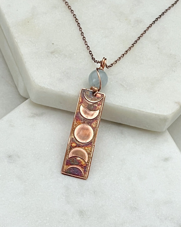 Moon phase acid etched copper necklace with aquamarine gemstone