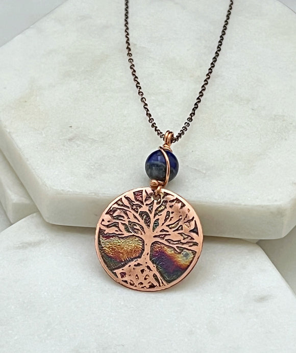 Acid etched copper tree necklace with lapis gemstone