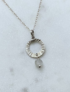 Sterling silver forged circle necklace with moonstone