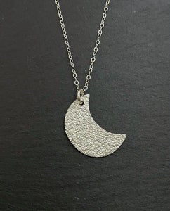 Sterling silver hammer textured crescent moon necklace
