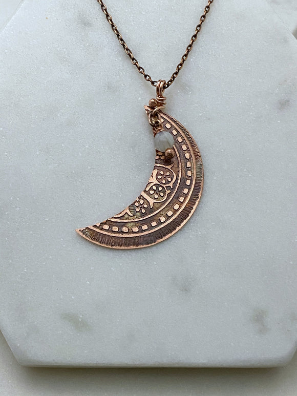 Crescent moon acid etched copper necklace with a moonstone gemstone