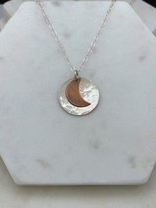 Sterling disk and copper moon necklace