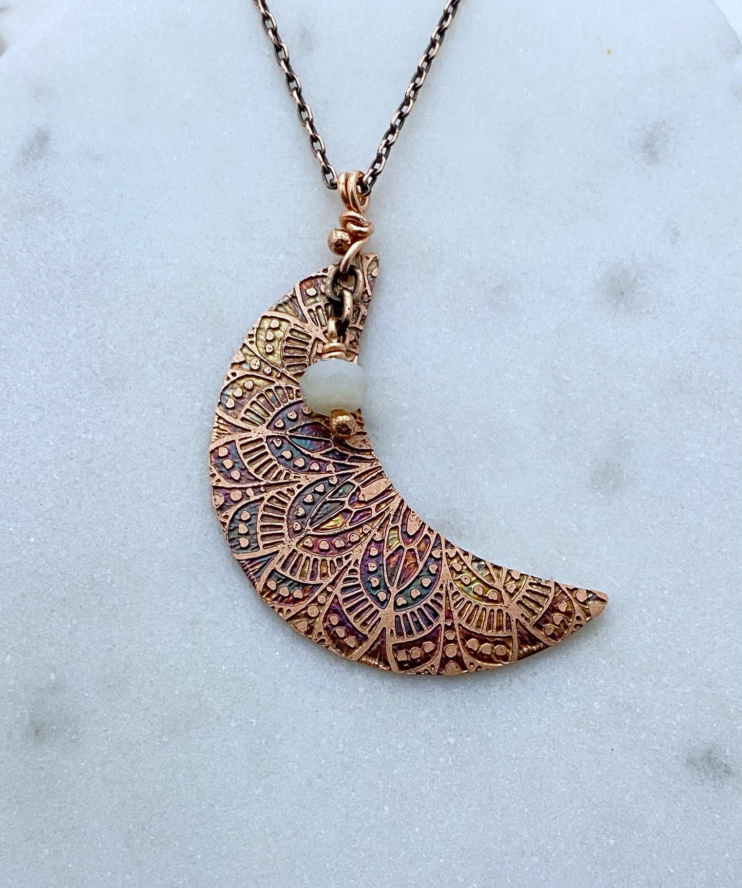 Crescent moon acid etched copper necklace with a moonstone gemstone