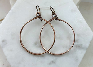Large copper hoop earrings