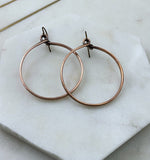 Large copper hoop earrings