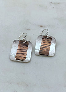 Sterling and copper mixed metal earrings.