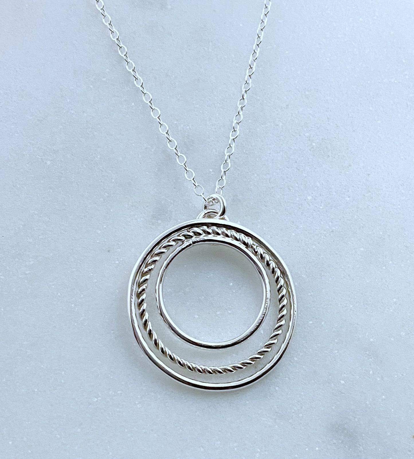 Sterling silver forged triple hoop necklace