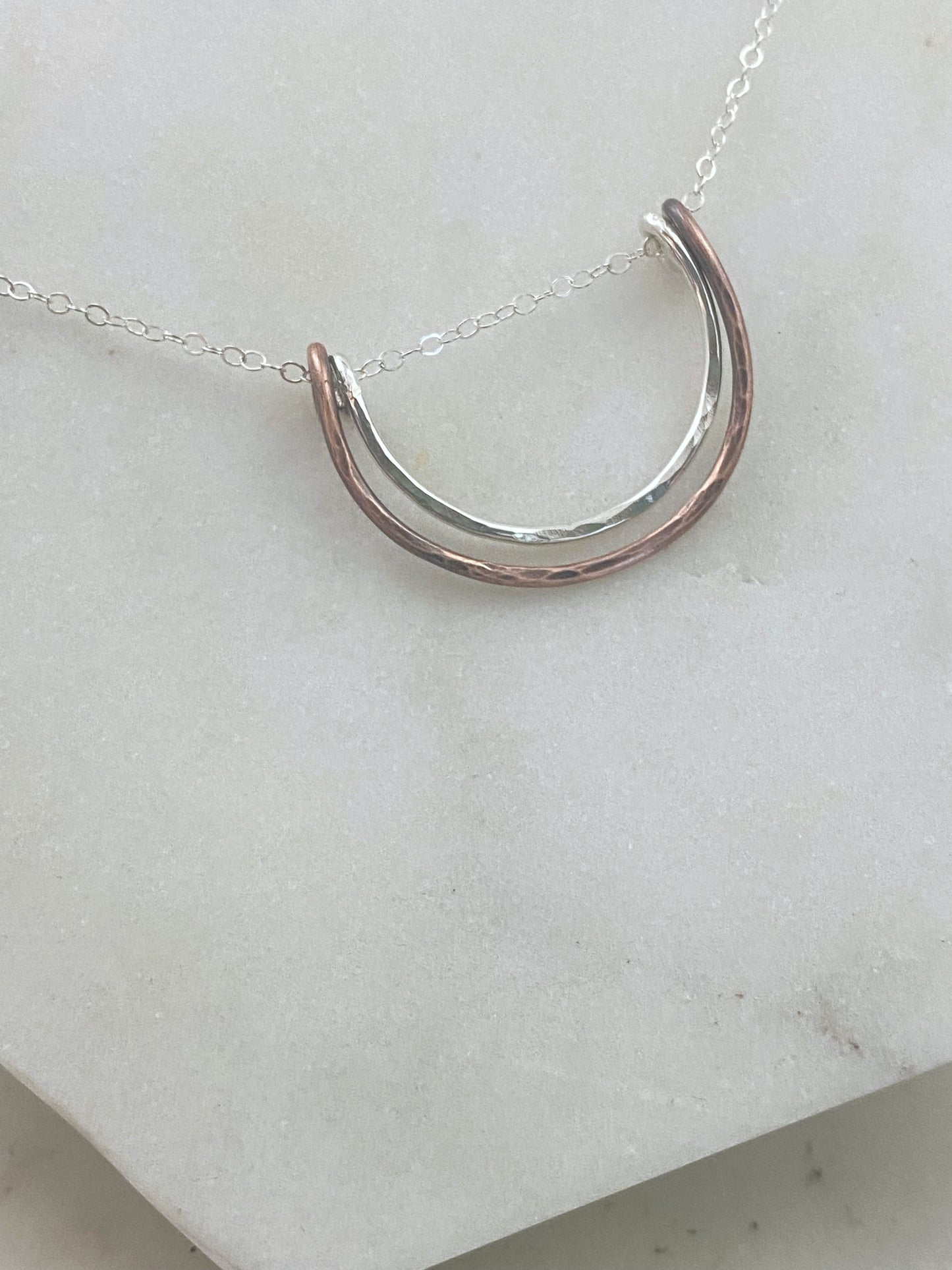 Forged sterling silver and copper wire half moon necklace