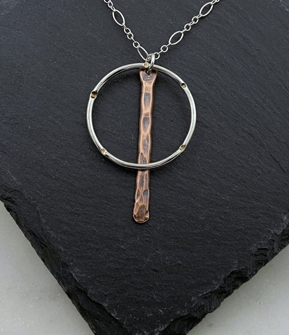 Sterling silver forged hoop necklace with copper paddle
