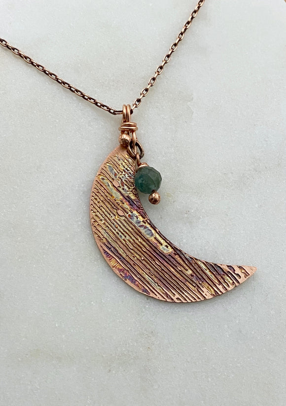 Crescent moon acid etched copper necklace with an apatite gemstone