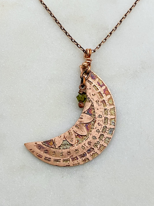 Crescent moon acid etched copper necklace with an olivine gemstone