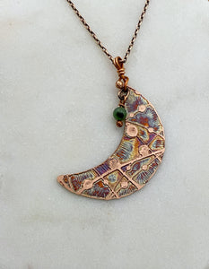 Crescent moon acid etched copper necklace with a ruby zoisite gemstone