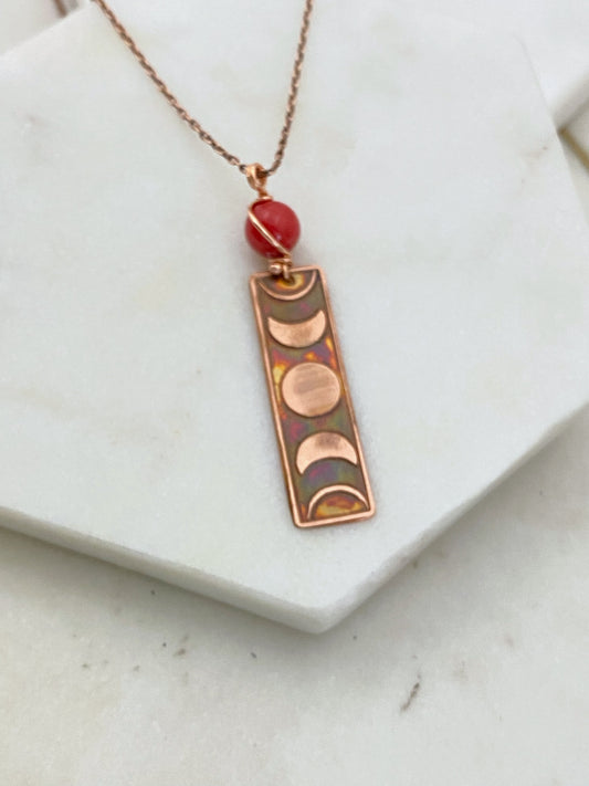 Moon phase acid etched copper necklace with coral gemstone