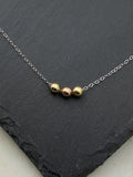 {Past, Present, Future} mixed metals necklace
