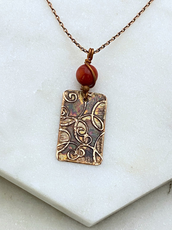 Acid etched copper necklace with coral gemstone