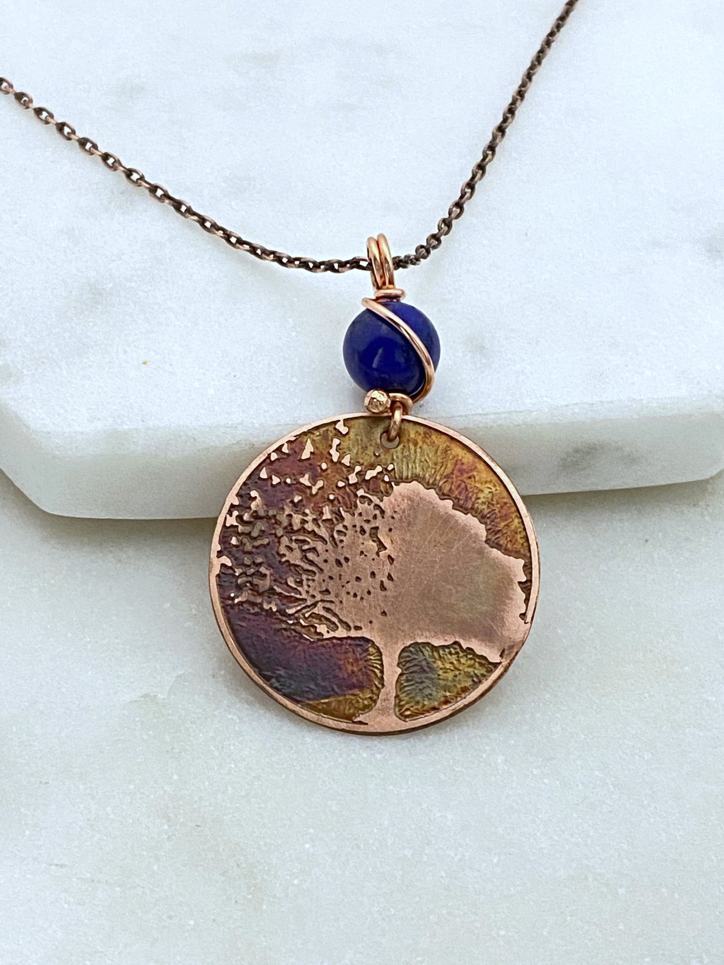 Acid etched copper blowing tree necklace with lapis gemstone