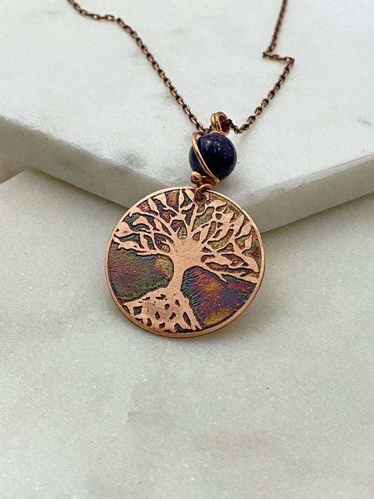 Acid etched copper tree necklace with lapis gemstone